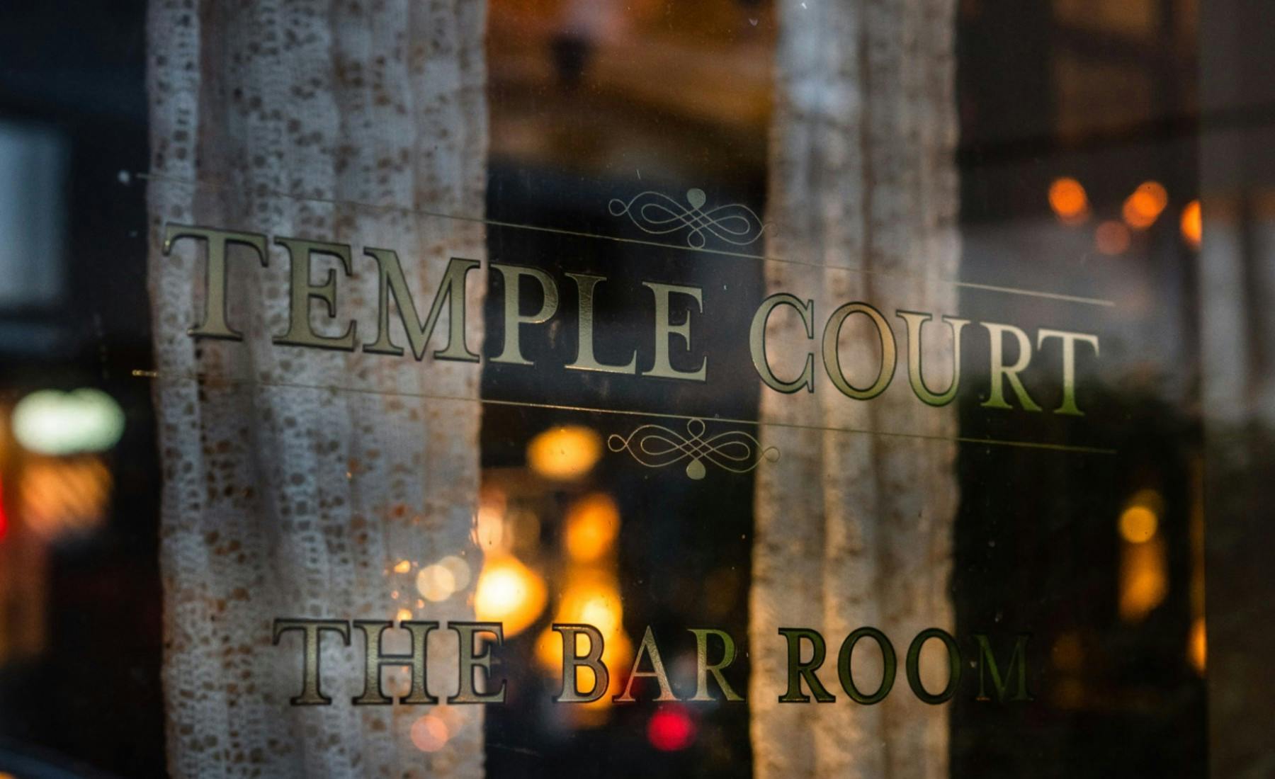 the Temple Court sign on the window